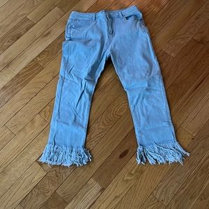 Ankle shredded jeans size 14.